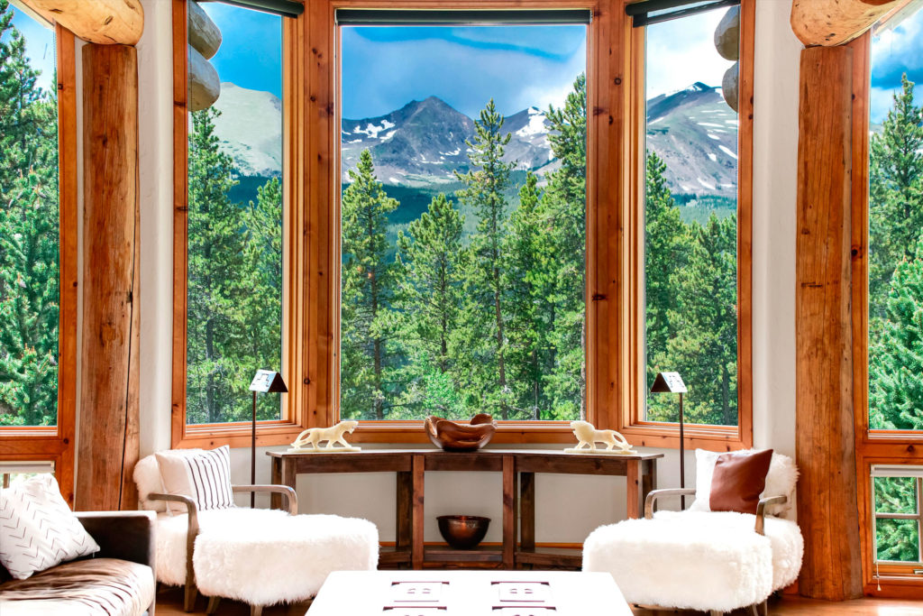 the view out a stunning window in breckenridge colorado while preparing your mountain property for sale