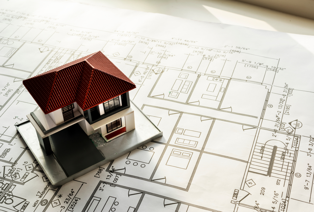 plans and model showing layout for building a house in colorado